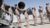 FILE - Turkish troops arrive at their military base in Doha, Qatar, June 23, 2017. 
