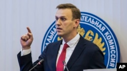 L'opposant russe Alexeï Navalny devant la commission électorale à Moscou, le 25 décembre 2017. 
