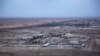 FILE - Al-Asad air base is seen in the western Anbar desert, Iraq, Dec. 29, 2019. 