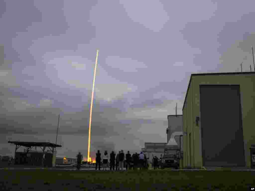 In this photo provided by NASA, the United Launch Alliance Delta 4-Heavy rocket, with NASA’s Orion spacecraft mounted atop, lifts off from the Cape Canaveral Air Force Station, Friday, Dec. 5, 2014.