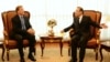 In this photo released by Thai Foreign Ministry, American charge d’affairs in Bangkok, W. Patrick Murphy, left, talks with Thai Deputy Foreign Minister Don Pramudwi during a meeting at the Foreign Ministry in Bangkok, Thailand, Wednesday, Jan. 28, 2015.