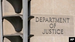 FILE - The Robert F. Kennedy Department of Justice Building is seen June 9, 2023, in Washington. A new U.S. law that for the first time allows Washington to prosecute foreign officials who receive bribes.