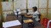 Maram Bawk La, manager of Laiza FM, at work in his studio. (P. Vrieze for VOA)