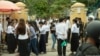 Students of BAC II examination hung around the examination center after finishing taking their exams, Phnom Penh, Cambodia, August 18, 2018. (Ty Aulissa/VOA Khmer) 