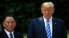  Manzon Koriya ta Arewa Kim Yong Chol poses da Donald Trump 