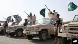 FILE - In this March 30, 2015 photo provided by the Saudi Press Agency (SPA), Royal Saudi Land Forces and units of Special Forces of the Pakistani army take part in a joint military exercise called "Al-Samsam 5" in Shamrakh field, north of Baha region, southwest Saudi Arabia. 