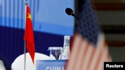 The Chinese and U.S. national flags are seen before the start of a Treaty on the Non-Proliferation of Nuclear Weapons conference with the U.N. Security Council's five permanent members, in Beijing, January 30, 2019.