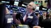 Trader Fran O'Connell works on the floor of the New York Stock Exchange, March 26, 2018. U.S. stocks rose sharply in early trading Monday as the market made up some of its huge losses from last week.
