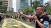 Hong Kong Protesters, Executive Vow Not to Give In