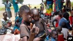 Une famille installée dans la région d'Aweil, au Soudan du Sud, le 16 septembre 2016.