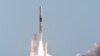  FILE - A rocket carrying a small lunar surface probe and other objects lifts off from the Tanegashima Space Centre on Tanegashima island, Kagoshima prefecture on Sept.7, 2023. Japan's "Moon Sniper" spacecraft will attempt a historic touchdown on the lunar surface this weekend.